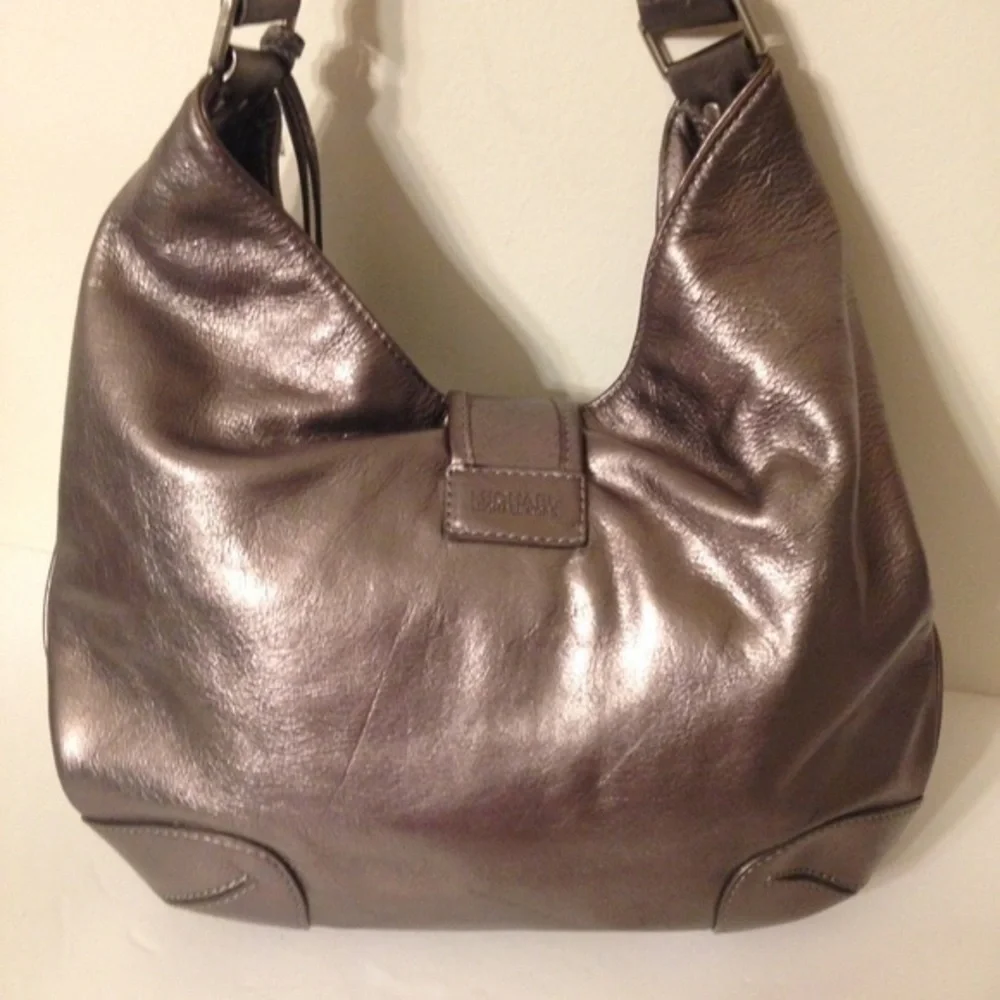 Michael Kors silver metallic hobo bag buckle